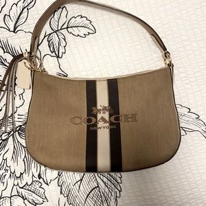 Jacquard coach purse, some signs of wear but nothing major, great condition